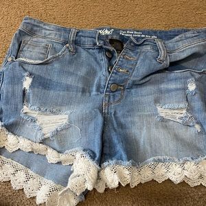 Lace trimmed denim shorts